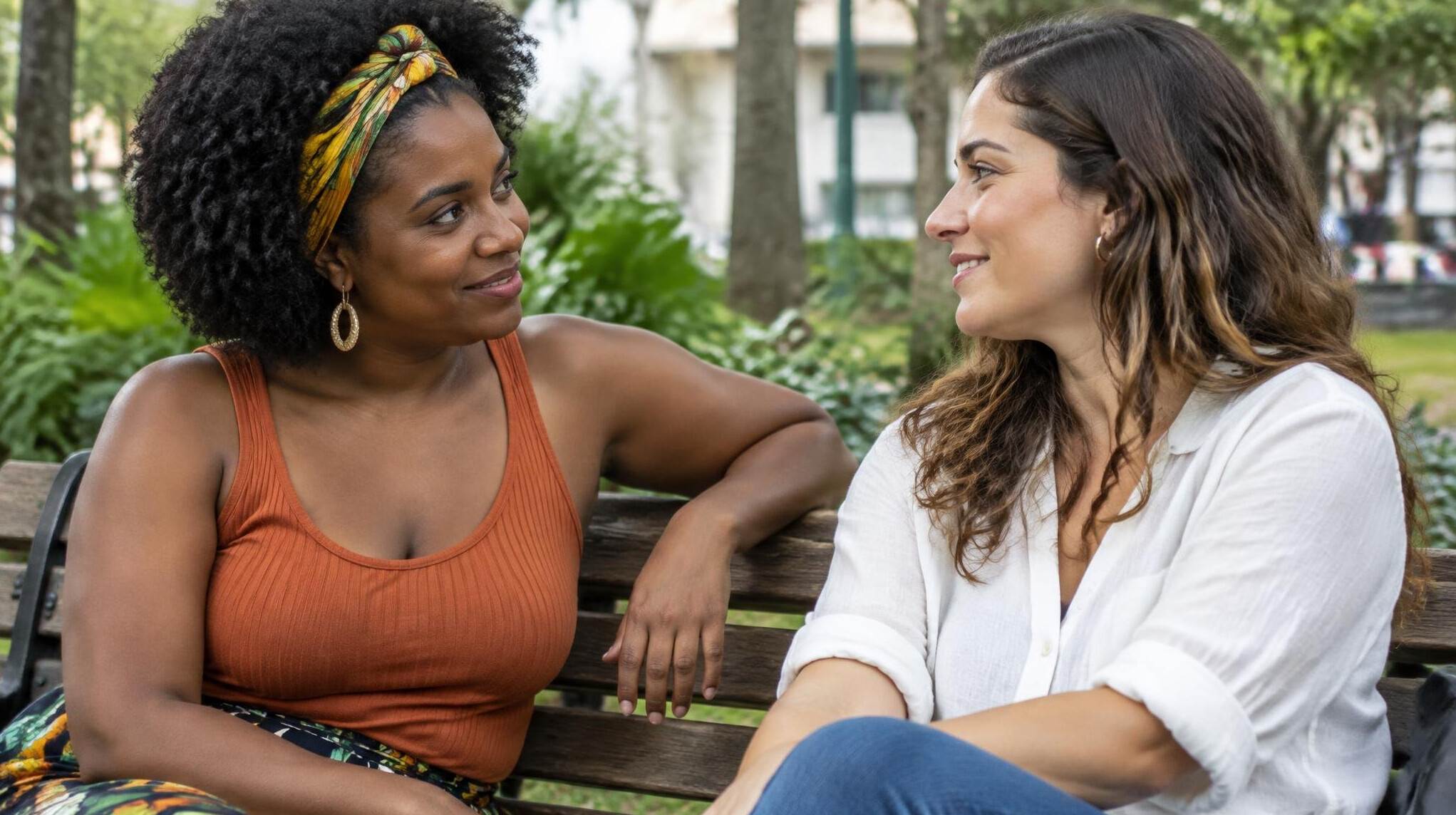 Two women having a warm outdoor conversation