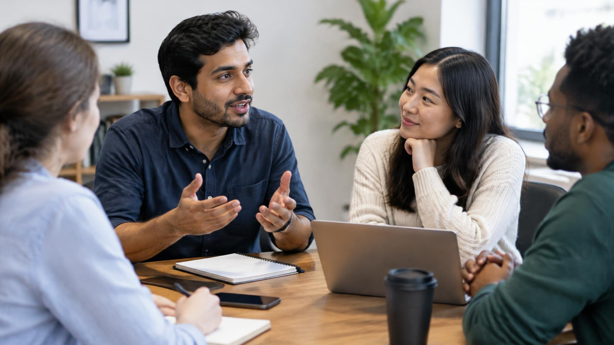 people talking in a meeting