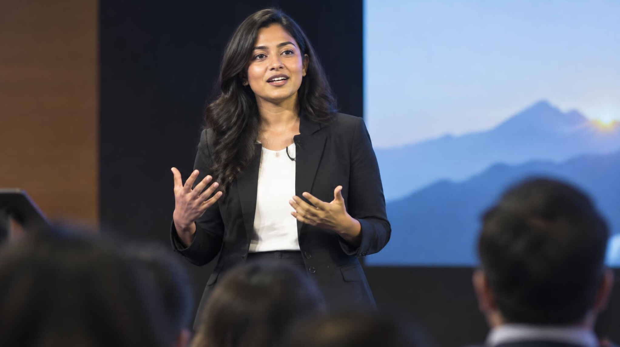 confident speaker addressing audience